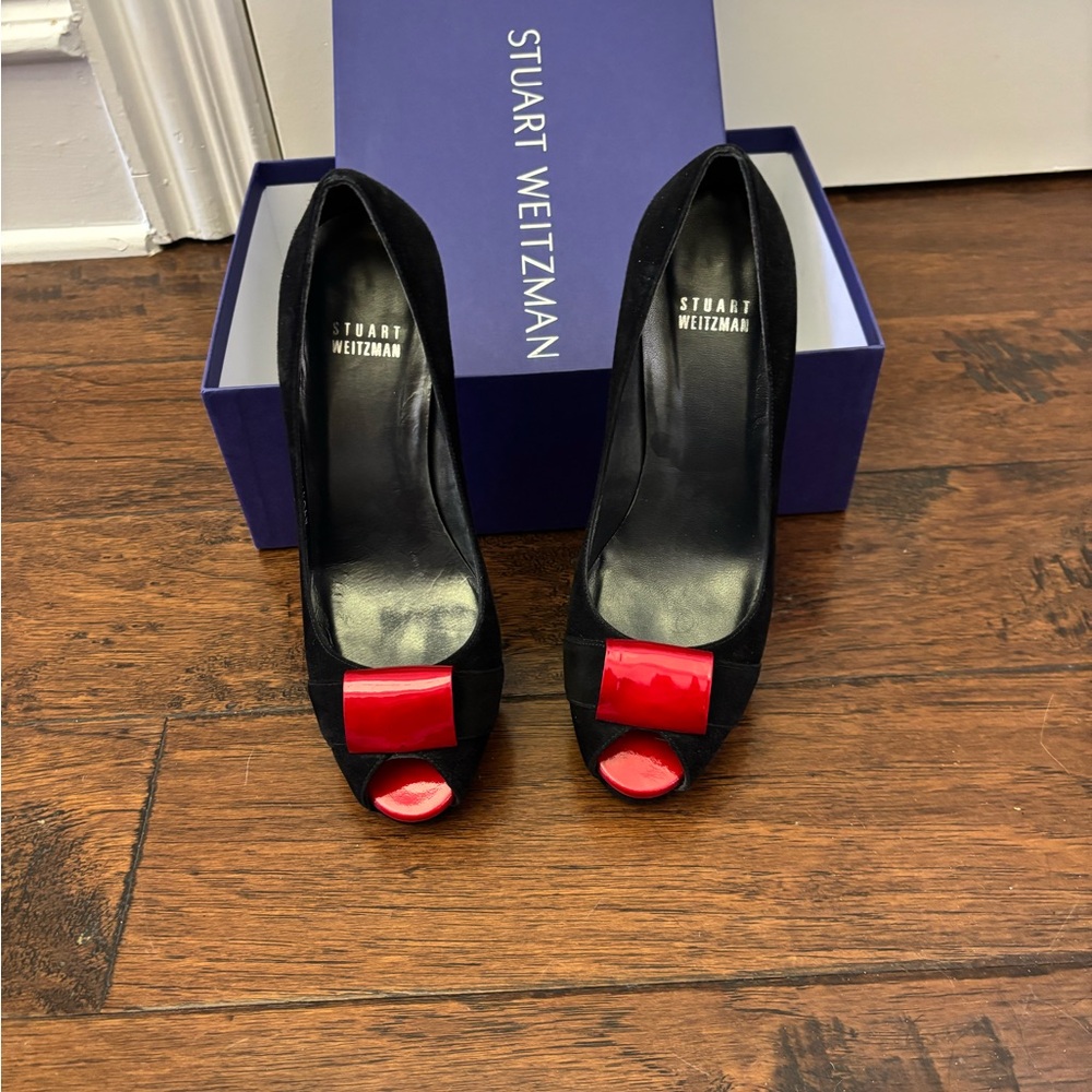 Stuart Weitzman Black Heels with Red Bow Accent